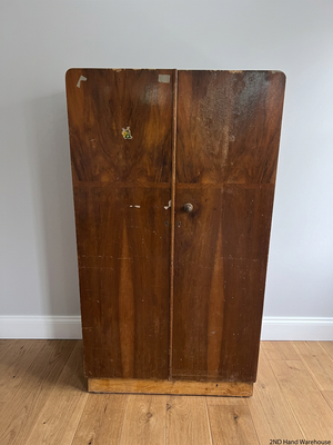 Vintage Dark Wood Two-Door Cupboard — Vintage Condition with Surface Wear and Stickers