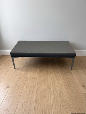 Black Upholstered Bench with Chrome Legs — Fair Condition with Visible Wear