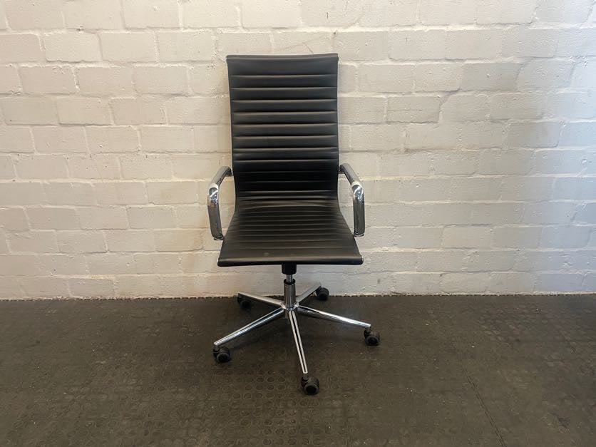 Black Ribbed Office Chair On Wheels