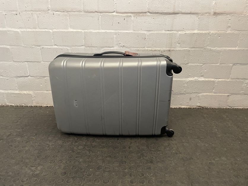 Grey Plastic Suitcase On Wheels