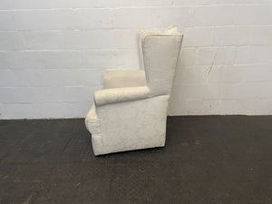 Cream Material Wingback Chair