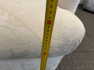 Cream Material Wingback Chair