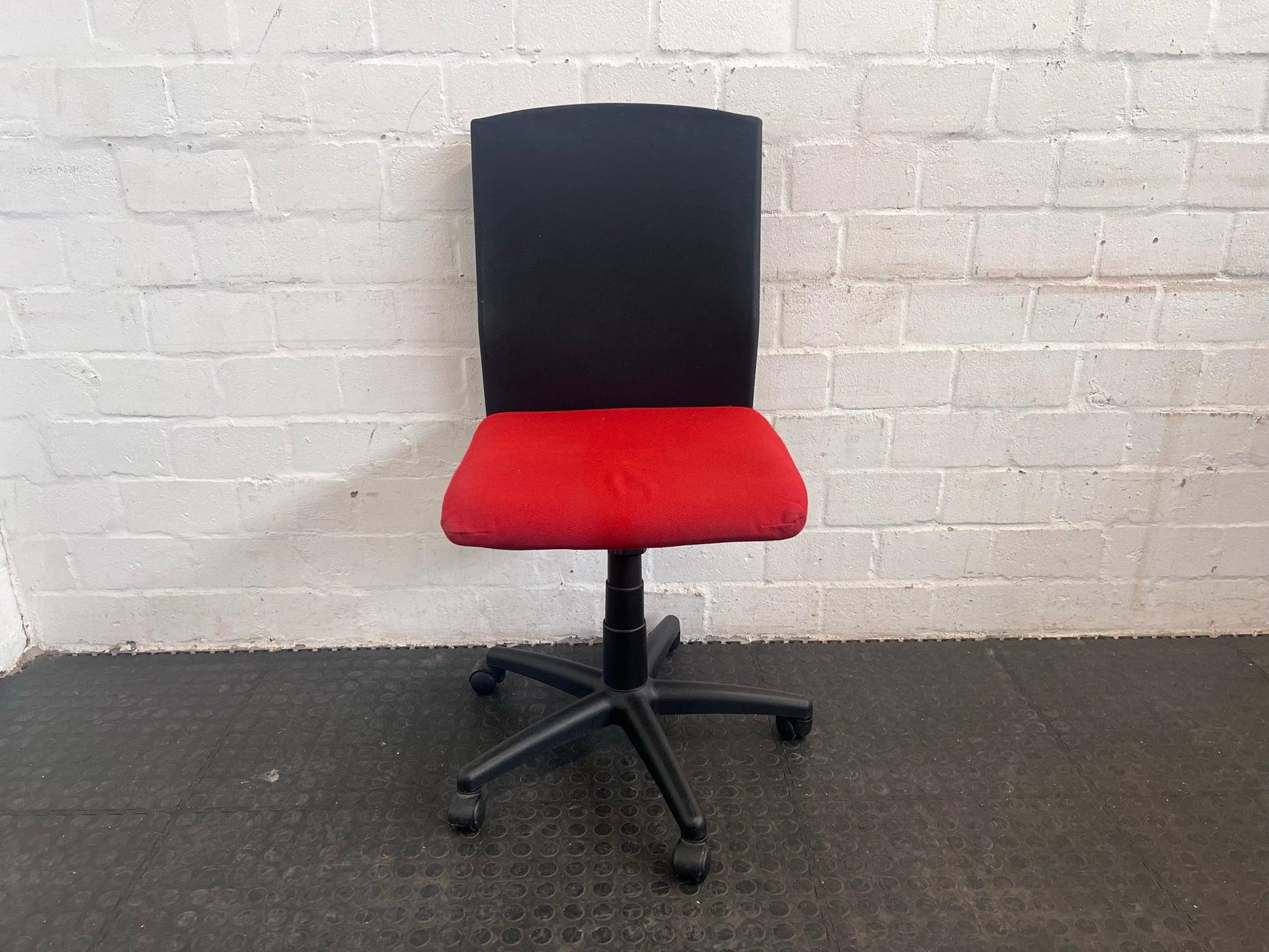 Black and Red Office Chair On Wheels (No Arm Rests)