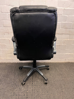 Black Padded Office Armchair on Wheels (Peeling Pleather)