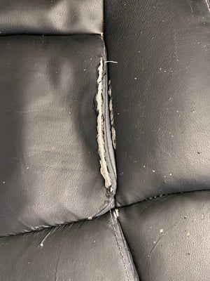 Black Padded Office Armchair on Wheels (Peeling Pleather)