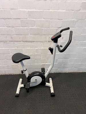 Compact White Exercise Bike with Minor Wear โ Perfect for Home Workouts
