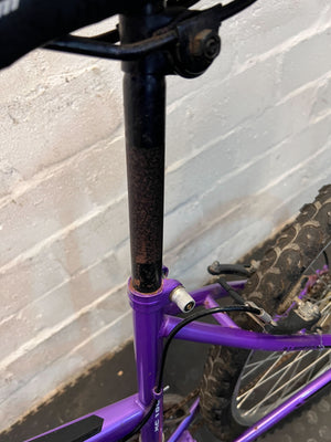 Vibrant Purple Mountain Bike – Slight Wear, Ready for Adventure!