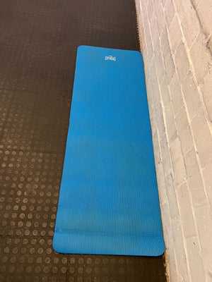 Bright Blue Yoga Mat – Slightly Worn, Great for Home Workouts