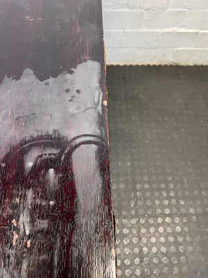 Rectangular Black Wooden Table with Wear