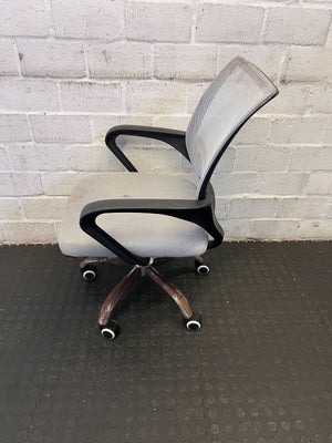 Comfortable Gray Mesh Office Chair with Minor Wear