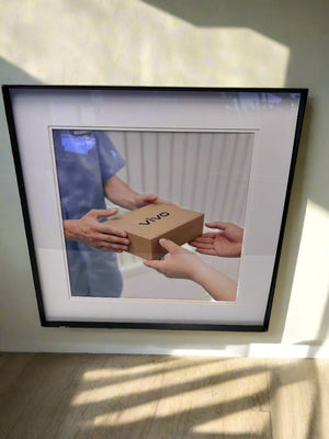 Framed Art Print of Package Hand-Off - Modern Style, Black Frame - 2ndhandwarehouse.com