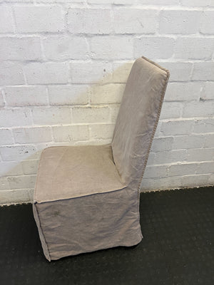 Stylish Beige Upholstered Dining Chair with Minor Wear