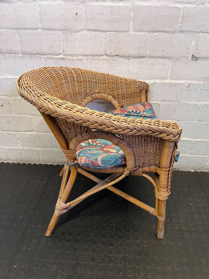 Charming Vintage Wicker Chair with Colorful Cushion