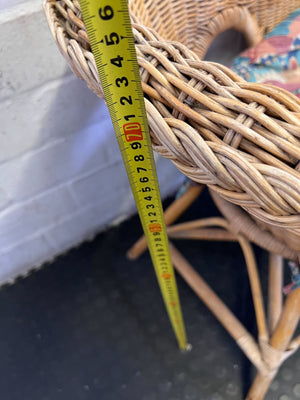 Charming Vintage Wicker Chair with Colorful Cushion