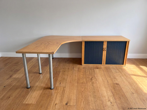 Light Oak L-Shaped Office Desk with Roller Shutter Credenza — Good Working Order with Water Damage on Surface - 2ndhandwarehouse.com