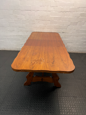 Extendable Wooden Trestle Dining Table — Visible Marks and Wear on Table Top