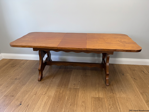 Extendable Wooden Trestle Dining Table — Visible Marks and Wear on Table Top