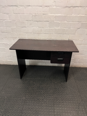 Black Compact Office Desk with Two Drawers — Visible Surface Wear
