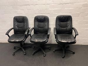 Black Leather Office Chair with Minor Wear and Tear