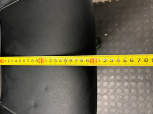 Black Mid-Back Swivel Office Chair with Contrast Stitching — Visible Wear; One Chair Has Unattached Armrests