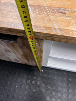 Cielo White and Natural Wood TV Unit — Mark from Candle Spillage on Surface