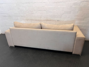 Comfortable 2-Seater Beige Sofa with Modern Chrome Feet
