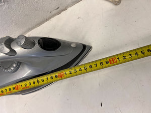 Compact Grey Steam Iron with Minor Wear – Not in Working Condition