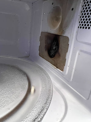 Compact Silver Univa Microwave - Excellent Condition with Minor Scratches - REDUCED