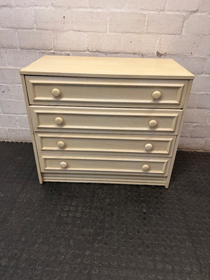 Cream Four-Drawer Chest with Moulded Panelling — Fair Condition with Visible Wear