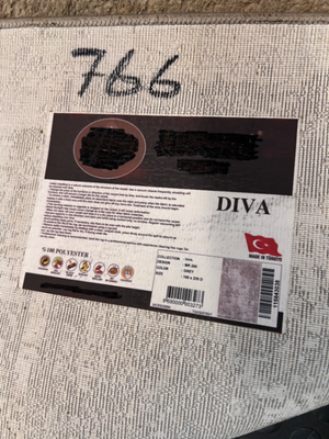 Diva Polyester Patterned Area Rug (230 x 160cm) — Used; Fair Condition