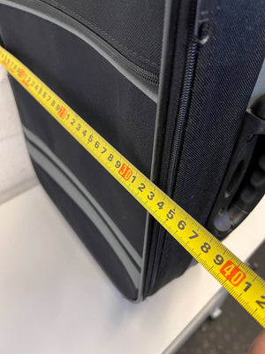 Elegant Black Rolling Travel Suitcase with Minor Wear