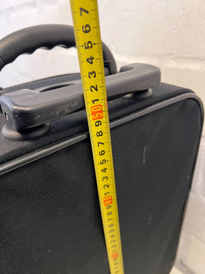 Elegant Black Rolling Travel Suitcase with Minor Wear