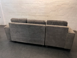 Grey Corduroy L-Shape Couch with Ottoman — One Broken Leg
