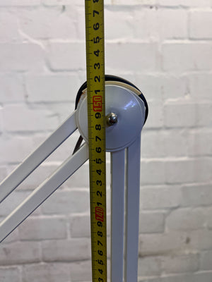 Versatile Adjustable White LED Floor Lamp with Rolling Base