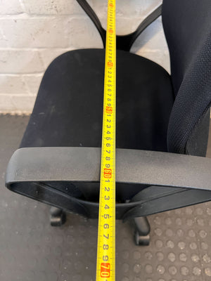 Comfortable Black Office Chair with Minor Wear