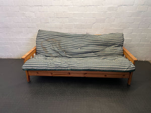 Versatile Pine Futon Sofa Bed with Patterned Cushion