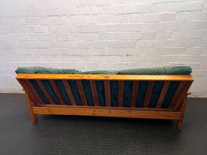 Versatile Pine Futon Sofa Bed with Patterned Cushion