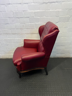 Elegant Vintage Burgundy Leather Wingback Chair with Minor Wear