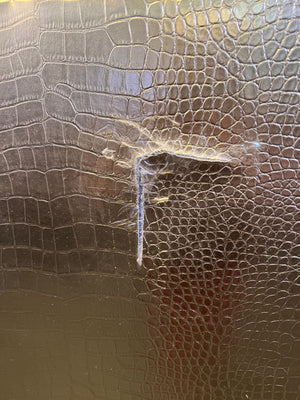 Glamorous Gold Faux Leather High-Back Armchair with Minor Wear