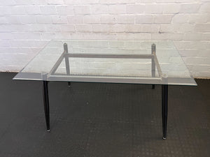Sleek Glass & Metal Dining Table with Tapered Legs- Fair used