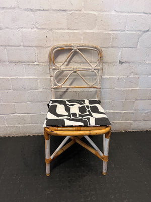 Distressed White Rattan Chair with Modern Graphic Cushion - 2ndhandwarehouse.com