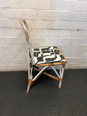 Distressed White Rattan Chair with Modern Graphic Cushion - 2ndhandwarehouse.com