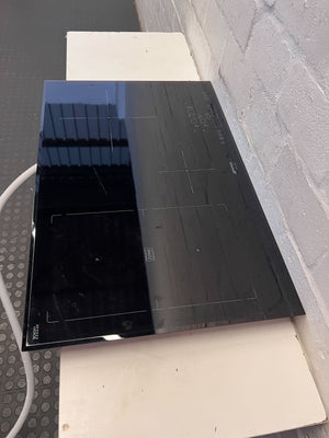 Sleek Smeg Induction Hob - Black Glass Cooktop for Modern Kitchens - 2ndhandwarehouse.com
