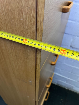 Stylish Light Wood 4-Drawer Storage Cabinet with Minor Wear