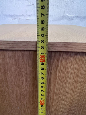 Stylish Light Wood 4-Drawer Storage Cabinet with Minor Wear