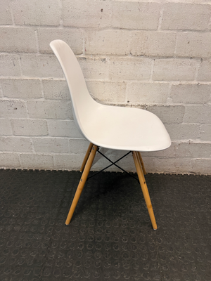 Moulded White Dining Chair with Wooden Legs — Visible Wear and Fair Condition