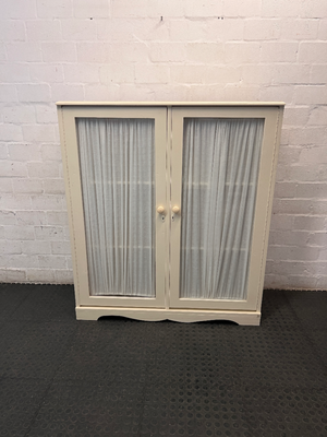 Off-White Wooden Storage Cupboard with Glass Inlay Doors — Fair Condition with Visible Wear