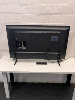 Sleek Black Flat Screen LED Television with Stand — Working Well; Heavily Used Condition