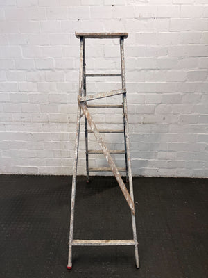 Sturdy 6-Step Aluminum Ladder with Minor Paint Stains