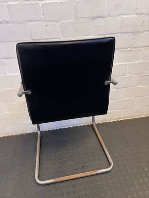 Stylish Black Leather Chair with Chrome Frame β Vintage Appeal Some Rust